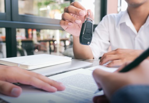 businessman-giving-car-key-and-customer-signing-loan-agreement_t20_bx2jz9 businessman-giving-car-key-and-customer-signing-loan-agreement_t20_bx2jz9