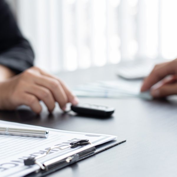 car-sales-representative-or-sales-manager-submits-a-car-key-to-a-client-who-has-approved-financial_t20_gLoQza car-sales-representative-or-sales-manager-submits-a-car-key-to-a-client-who-has-approved-financial_t20_gLoQza